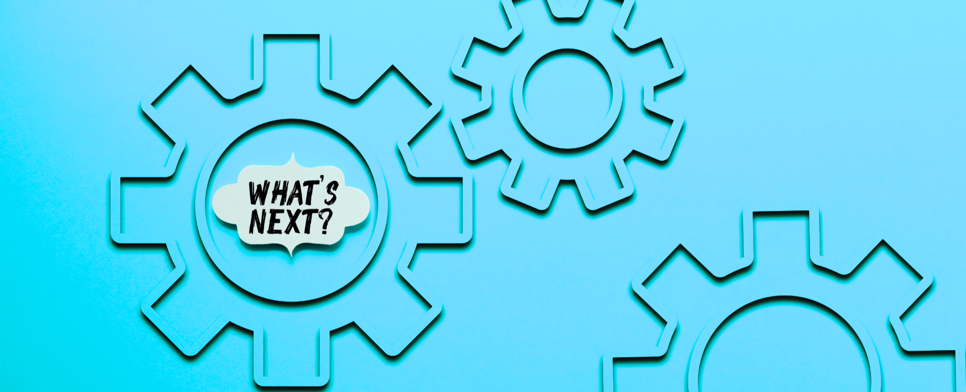 all in turquoise 3 gears with words in on of them